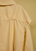 Load image into Gallery viewer, YOLK CREAM RAINCOAT